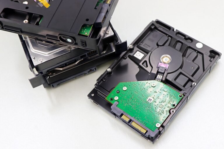 Stack of open NAS hard disk drives — comparing budget NAS hard drives for a home server build