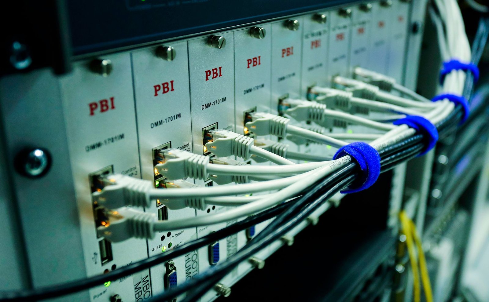 Managed network switch and Ethernet cables in a home lab rack